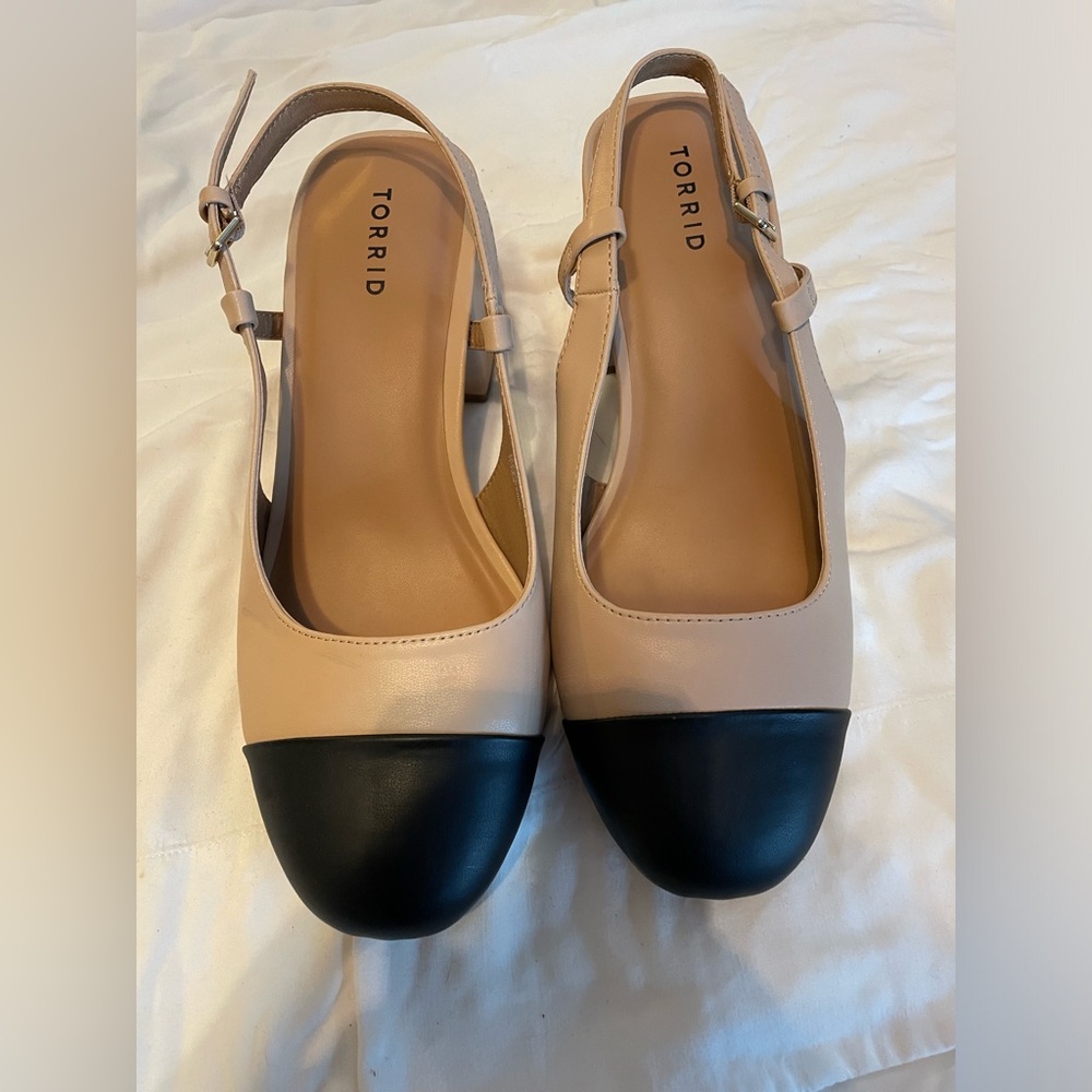 Size 11.5WW capped toes sling backs.